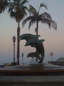 Where am I? (Hint: the dolphins are jumping from a pier.)